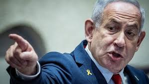 People struggle against the wind and rain in Malmö, Sweden, after a storm reached southern Sweden, Saturday Oct. 4, 2025. (Johan Nilsson/TT via AP)